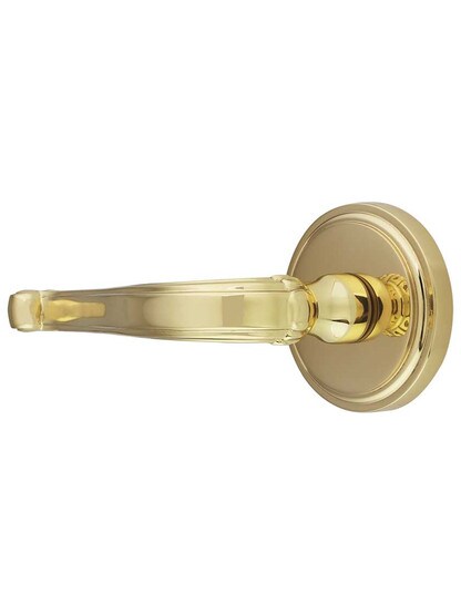 Gillian Rosette Door Set with Scroll Levers in Polished Brass.